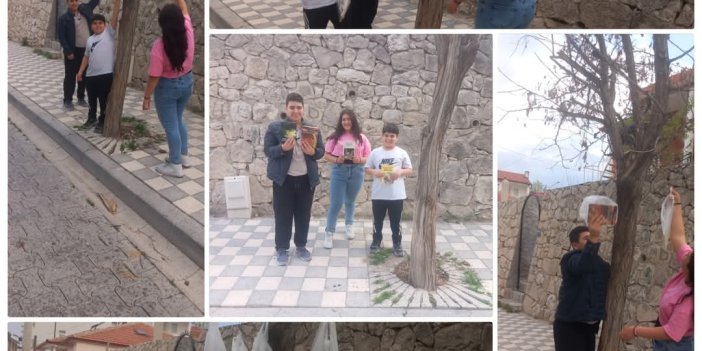 Konya'da ağaçlara kitap asarak vatandaşlara kitap hediye etti