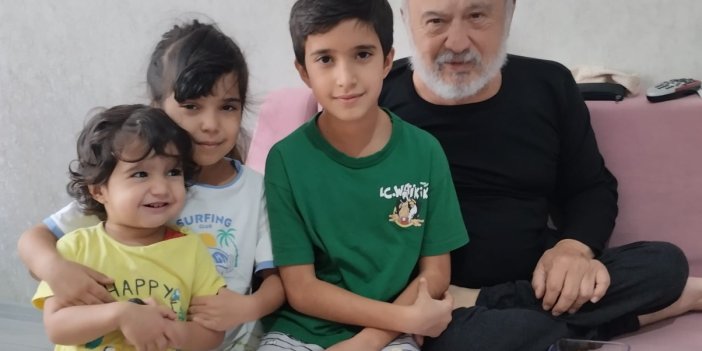 Ünal torunlarıyla mutlu