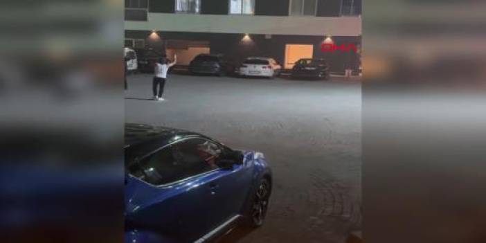 Yere döktüğü benzini ateşe veren kadın tabancayla da tehdit etti